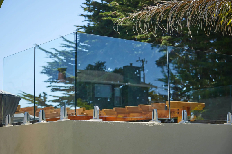 Clear Glass Panels with Talon Spigots san diego | West Coast Aluminum Railing Systems
