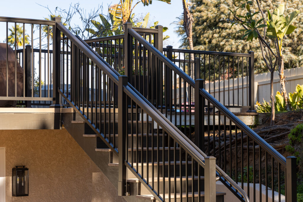 Sleek aluminum railing providing open views for Poway backyard